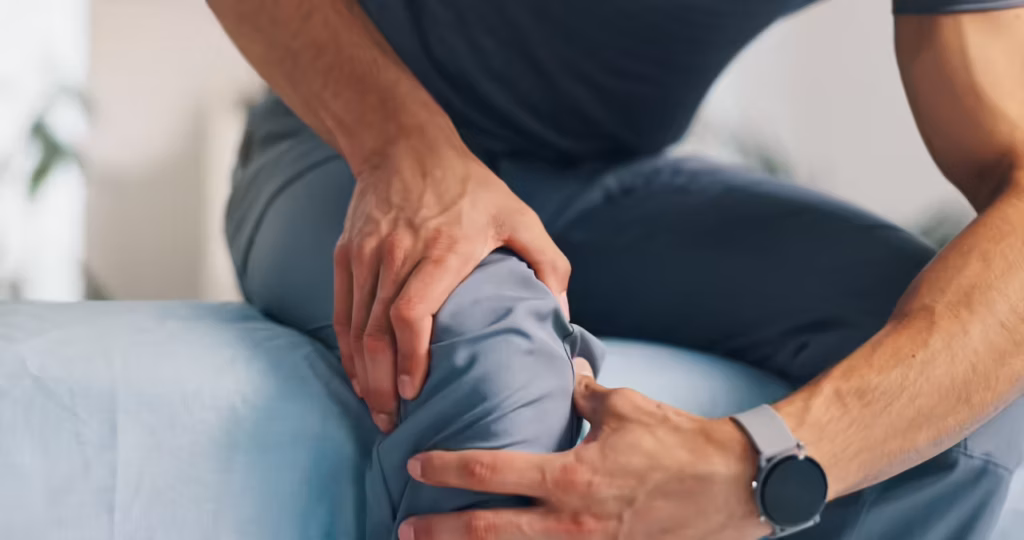 pain knee and person with hands on injury for pro 2026 03 25 06 57 54 utc